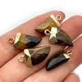 Tiger eye stone chili-shaped pendants with golden plated edge held in hand palm - 10x20mm / Tiger's Eye