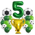 Soccer party set detail with green number 5, champion trophy and football foil balloons - Number 5 Theme