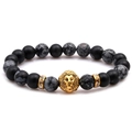 Matte black stone and snowflake obsidian bead bracelet with golden lion head charm - Snowflake Obsidian + Gold