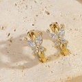 Macro shot of gold butterfly drop earrings with sparkling white cubic zirconia - Gold White Zircon Butterfly