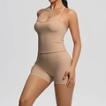 Close-up of seamless light brown yoga set with sports camisole and high waist shorts - Medium Khaki