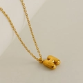 Golden necklace featuring a polished 3D bubble letter H pendant on a fine cross chain - Letter H
