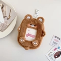 Detailed view of plush bear card holder with secure white hanging clip and clear ID window - Brown Bear