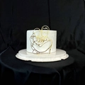Golden acrylic line art cake topper featuring a father holding a baby for baby showers - Father Holding Daughter / Gold