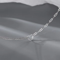 Macro shot of silver clavicle necklace with heart pendant and mixed link chain - Heart Asymmetric Necklace