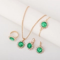 Golden bridal jewelry set with emerald green stones and sparkling diamond accents - 4-Piece Set (With Bracelet) / Round-Green