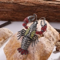 Broche homard scintillante avec strass rouges et jaunes sur base en alliage gris foncé - Rouge
