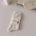 Creamy white mid-calf socks featuring a unique 3D grid texture and ribbed cuffs - Lines Texture (1 Pair)