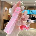 Porte-clés ours liquide rose avec paillettes et sangle pour sacs à dos de filles - Ours Sable Mouvant - Fleur De Cerisier Rose / Rose
