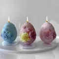 Easter egg candles with embossed flower patterns in blue, yellow, and purple colors - Easter Flower Egg B ZL-966