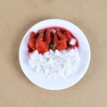 Miniature toy bowl with realistic braised pork over rice on a white plastic plate - Chicken Drumstick Rice Bowl