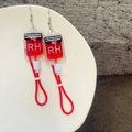 Harajuku blood bag earrings with red liquid and blood group print in y2k style - Type RH Ear Hooks