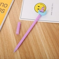 Purple cartoon gel pen with unicorn moon pendant on a minimalist wooden desk - Purple Moon Unicorn