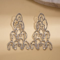 Macro detail showing silver irregular wavy geometric drop earrings with sparkling crystals - Silver (Silver Pin)