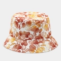 Detail of canvas bucket hat featuring warm autumn leaf patterns in orange and yellow tones - Orange-Brown Autumn Leaves Style (Color #8)