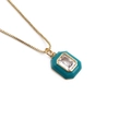Gouden box ketting met een rechthoekige kristallen hanger en turkoois emaille rand - Blauw