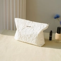 White jacquard rose texture makeup bag with zipper closure and woven brand tag - Bubble Rose White