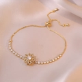 Elegant rotating flower necklace set with micro-inlaid zircon and gold-plated finish - Rotating Flower Bracelet / Gold