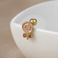 Detailed macro view of lollipop stud earring with pink glaze and red zircon accents - 60065-9 Gold - Spiral Lollipop