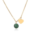 Detail of gold O-chain necklace featuring a malachite bead and heart-shaped pendant - 10MM Bead / Gold-Malachite