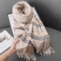 Beige plaid warm scarf with tassels shown in a professional lifestyle aesthetic setting - 70*180cm / Khaki