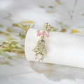 Pink bow and gold bell barbell stud earring with clear zircon dangle on a white stand - Pink Bow Bell (A275-3#) / Light Coffee Gold (Single Piece)