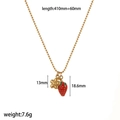 Collana con perline dorate e ciondolo a fragola e fiore in acciaio inox, 410mm - Collana con Fiori e Fragola (TN3560)