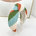 Detailed close-up of colorful knotted straw headband with woven texture on acrylic stand - Multi-color Wide Stripe