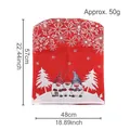 Christmas chair cover featuring three gnomes and snowflakes, size 57cm x 48cm - Gnome Print Red