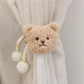 Detail of plush bear curtain tieback with white pearls on a sheer white curtain - Light Corn Rope Milk Tea Bear