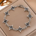 Gothic silver-tone bracelet with black enamel cross links and lobster clasp closure - Silver Black Oil Drip Cross Flower Bracelet (X040)