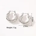 Detailed view of silver twisted hoop earrings with thick spiral texture and pin clasp - KC-E20 Silver Spiral Twisted