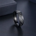 Macro detail of a black frosted titanium steel ring with diagonal engraved patterns - Size 6 / Black