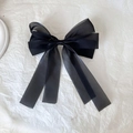 Elegant black organza butterfly hair clip with shimmering translucent fabric finish - Black