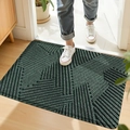 Dark green PVC entrance mat with geometric pattern shown with someone stepping on it - 45*75cm / Geometric Space - Green (Silk Loop)