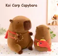 Adorable capybara plush toy featuring a cute red fish messenger bag for kids - Brown (Koi Fish Backpack) / 30 cm