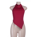 Detail of red halter neck top with irregular hemline on a display mannequin - S / Red