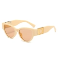 Chic oval cat-eye sunglasses with cream frames and orange lenses for outdoor wear - Beige Frame Champagne Lenses