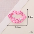 Macro detail of pink rhinestone lips charm with dimensions 2.5cm width and 1.7cm height - D302 Small Lips (Pink)