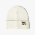 Minimalist cream knit beanie with embroidered patch detail for winter warmth - One Size / White