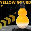Creative yellow gourd-shaped water bottle with black cap on a dark display stand - 950ML / Yellow (With Strap + Carry Rope)