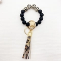 Silicone bead keychain bracelet with leopard print tassel and gold geometric accents - Black Leopard