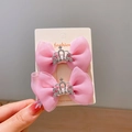 Juego de dos horquillas con lazo de organza rosa y detalle de corona plateada - Lazo de Corona Rosa