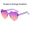 Frameless heart-shaped sunglasses with purple to orange gradient lenses and clear temples - Purple to Orange Gradient