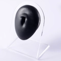 Detail of a black silicone piercing model with a transparent acrylic display stand - Black-Belly Button