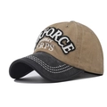 Close-up of military embroidery and reinforced white stitching on a canvas baseball cap - Adjustable / Washed Khaki