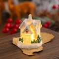 Detail of white resin Christmas house ornament with warm LED light and snow texture - White Style F (Christmas Small House)