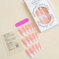Detail of pink long fake nails with floral and butterfly accents and application kit - Pink French Style with 3D Flowers Butterfly Rhinestones and Pearls (XE-70-43)