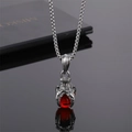 Collier griffe de dragon gothique avec pendentif pierre rouge sur chaîne argentée - Griffe d'Aigle Perle Rouge
