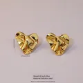 Golden heart-shaped crumpled earrings in stainless steel with textured wavy surface - Stainless Steel Wave Heart Studs
